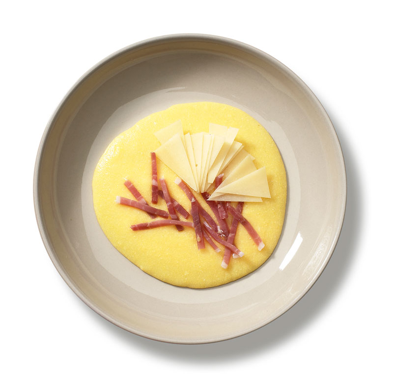 Polenta con Speck Alto-Adige IGP e rapatura di Asiago Stagionato DOP